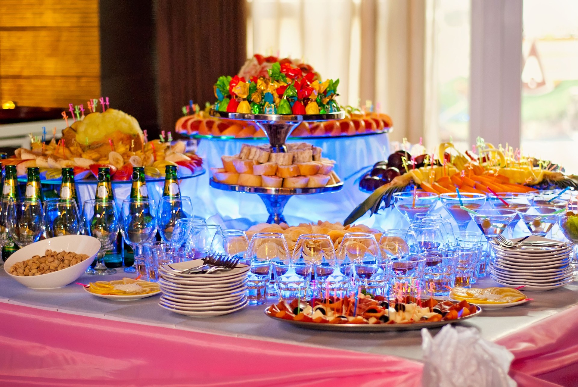 Glass glasses with colored drinks on the table. alcoholic drinks at the buffet
